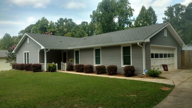 Roof replacement with new asphalt shingles on residential property - Thaxton Roofing