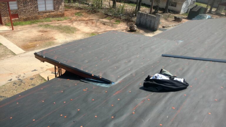 Roofing Repair work in progress on a house in Georgia