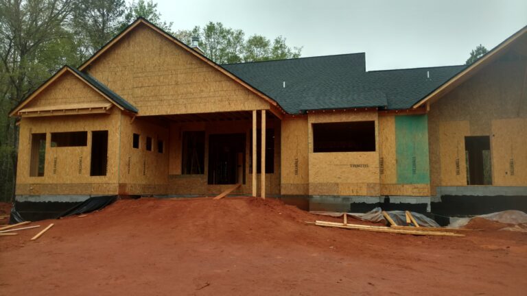 A house under repair work - a roof repair being done