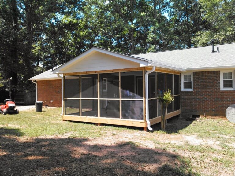 Newly constructed extended lobby from a house with metal padding and Asphalt Shingles roof
